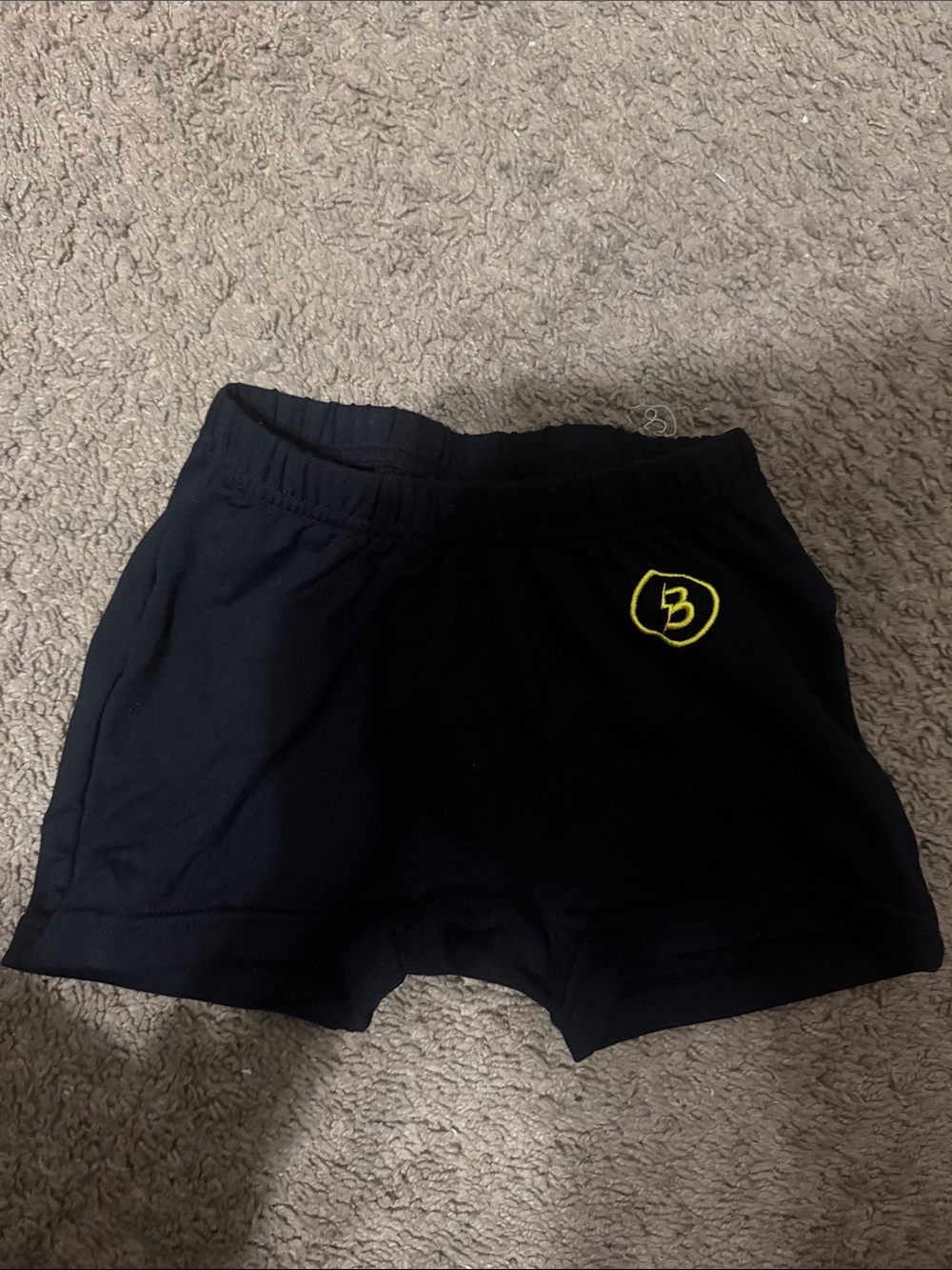 Girls Black Athletic Shorts with Yellow Logo Accent